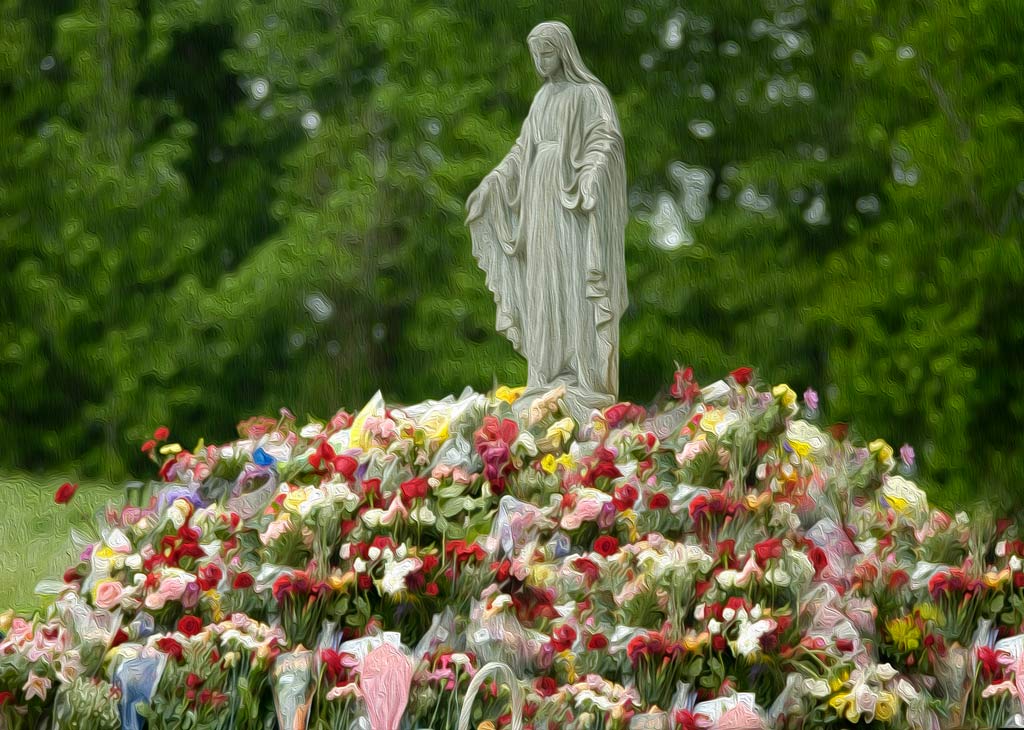 Our Lady with thousands of flowers at Her feet