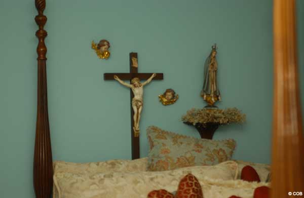 crucifix over bed