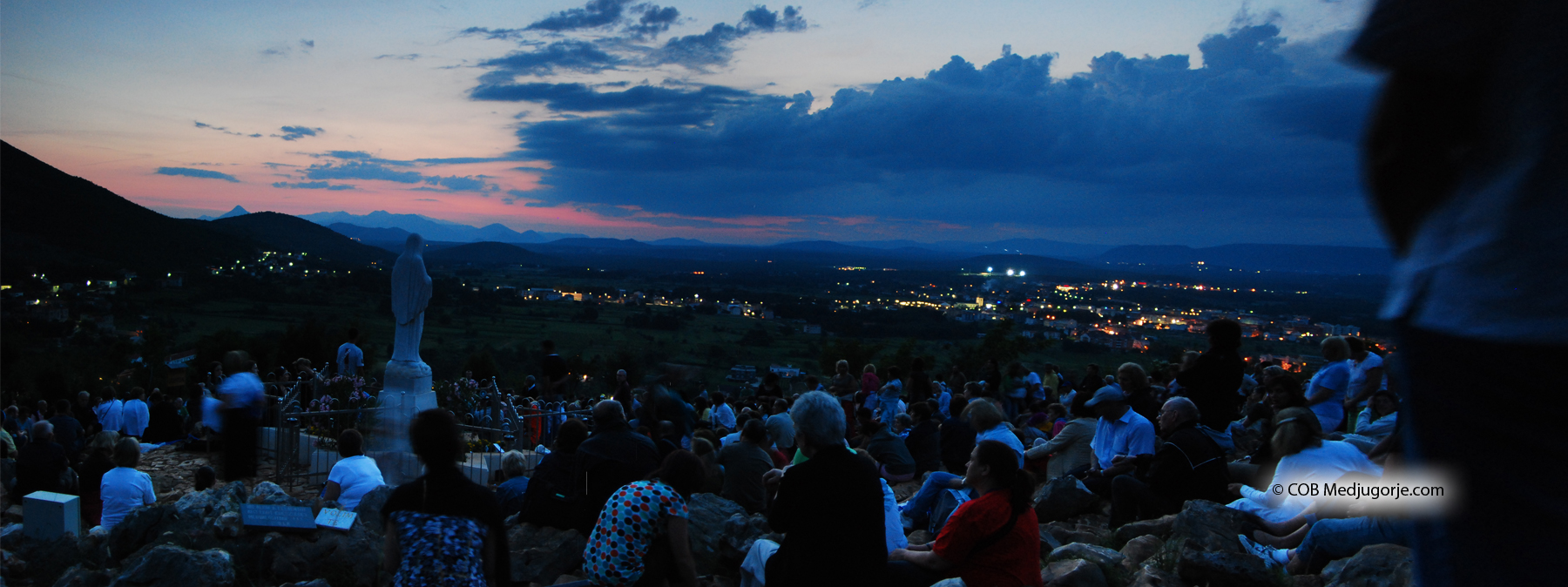 Pilgrims await Our Lady on Apparition Mountain in Medjugorje
