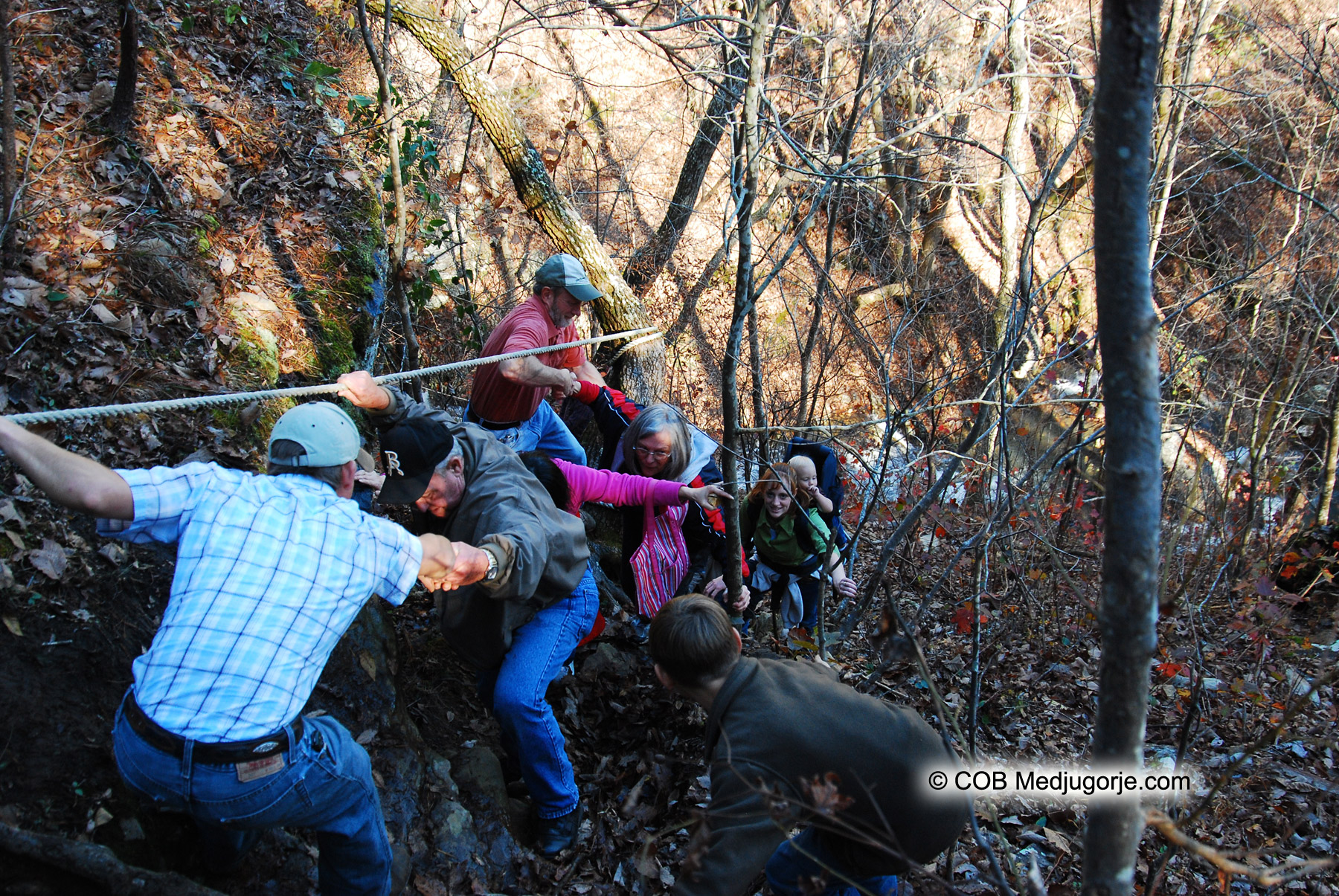 pilgrims-climbing-grotto-december-9-2009-caritas