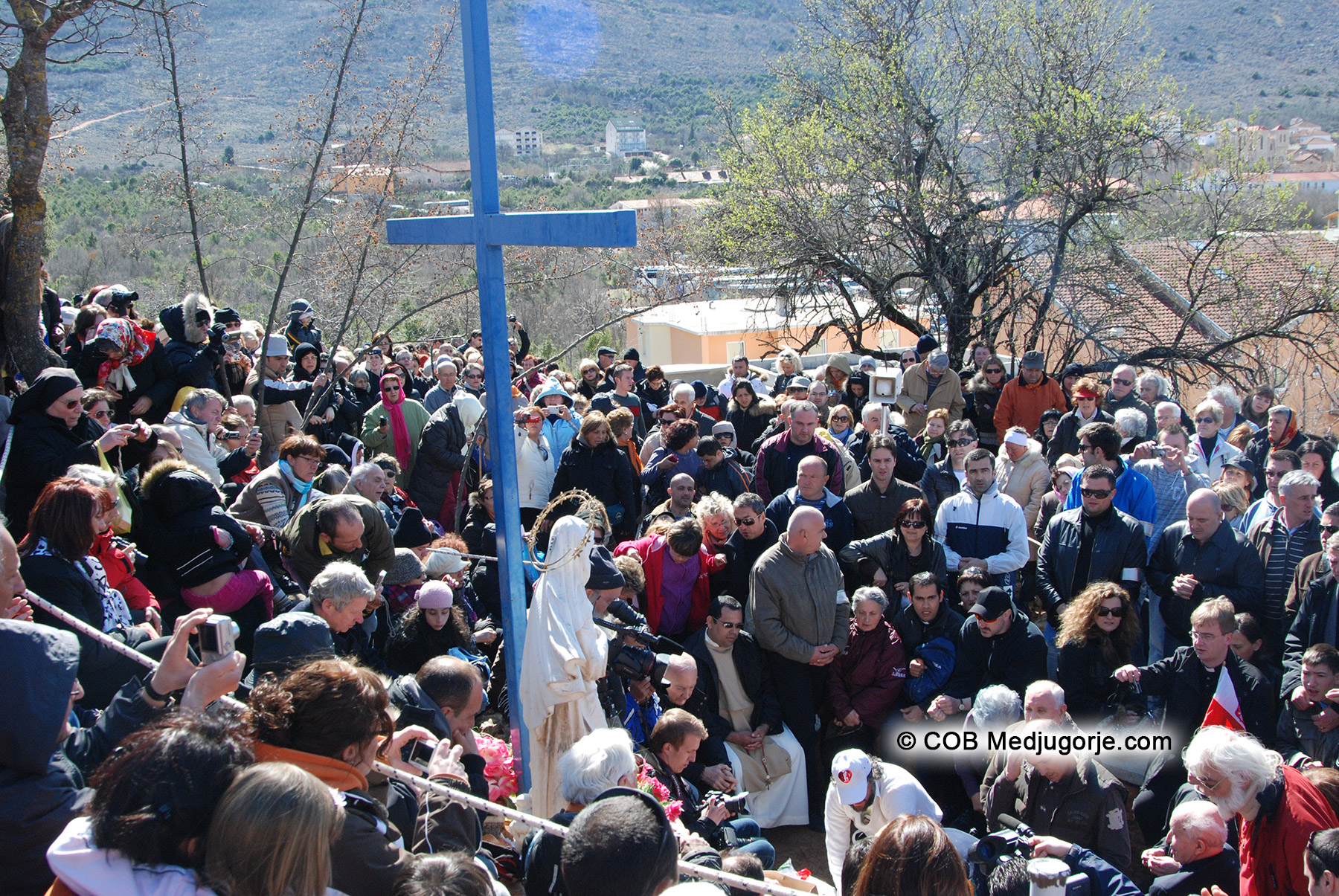 crowd of pilgrims await Our Lady's words in Medjugorje