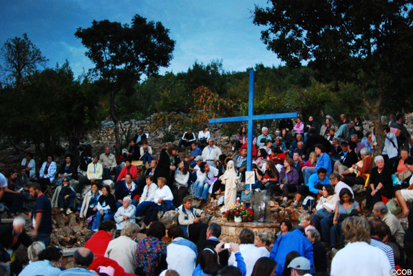 More Pilgrims praying at the Blue Cross September 6, 2010