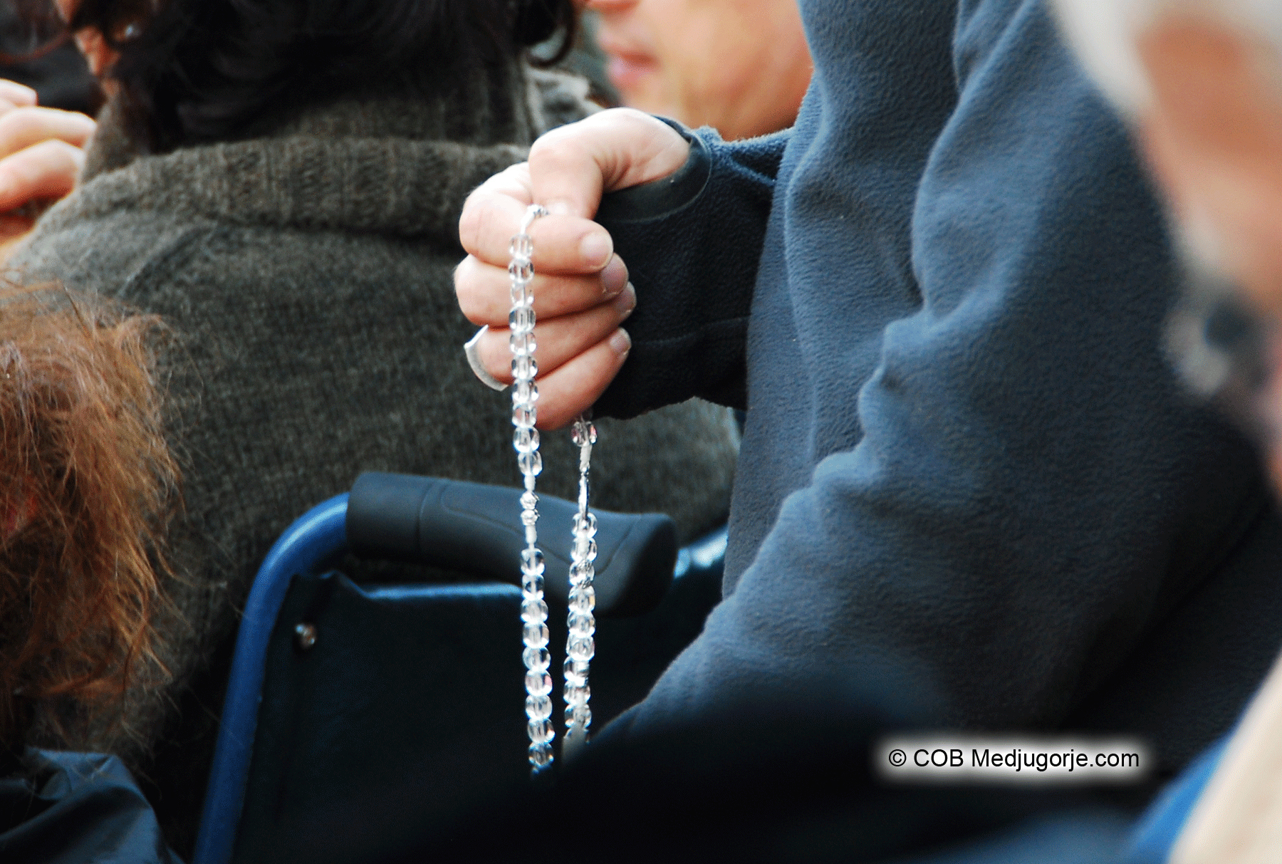 Pilgrim Praying the Rosary