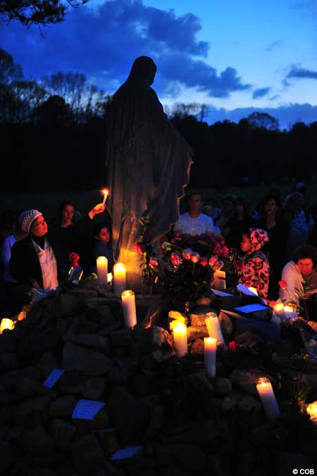 Pilgrims praying in the field of Apparitions