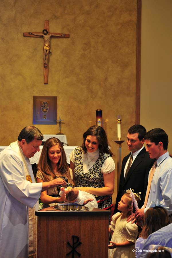 Lucy being baptized