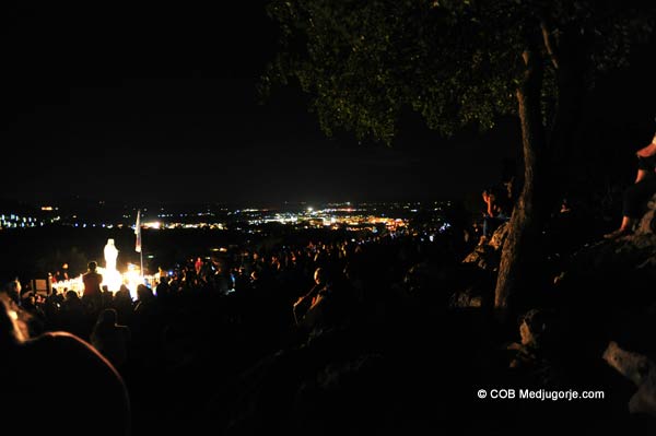 pilgrims at Medjugorje visionary Ivan's apparition on Apparition Mountain