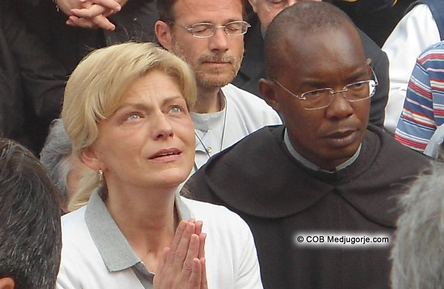 June 2, 2012 Mirjana with Priest holding her hand