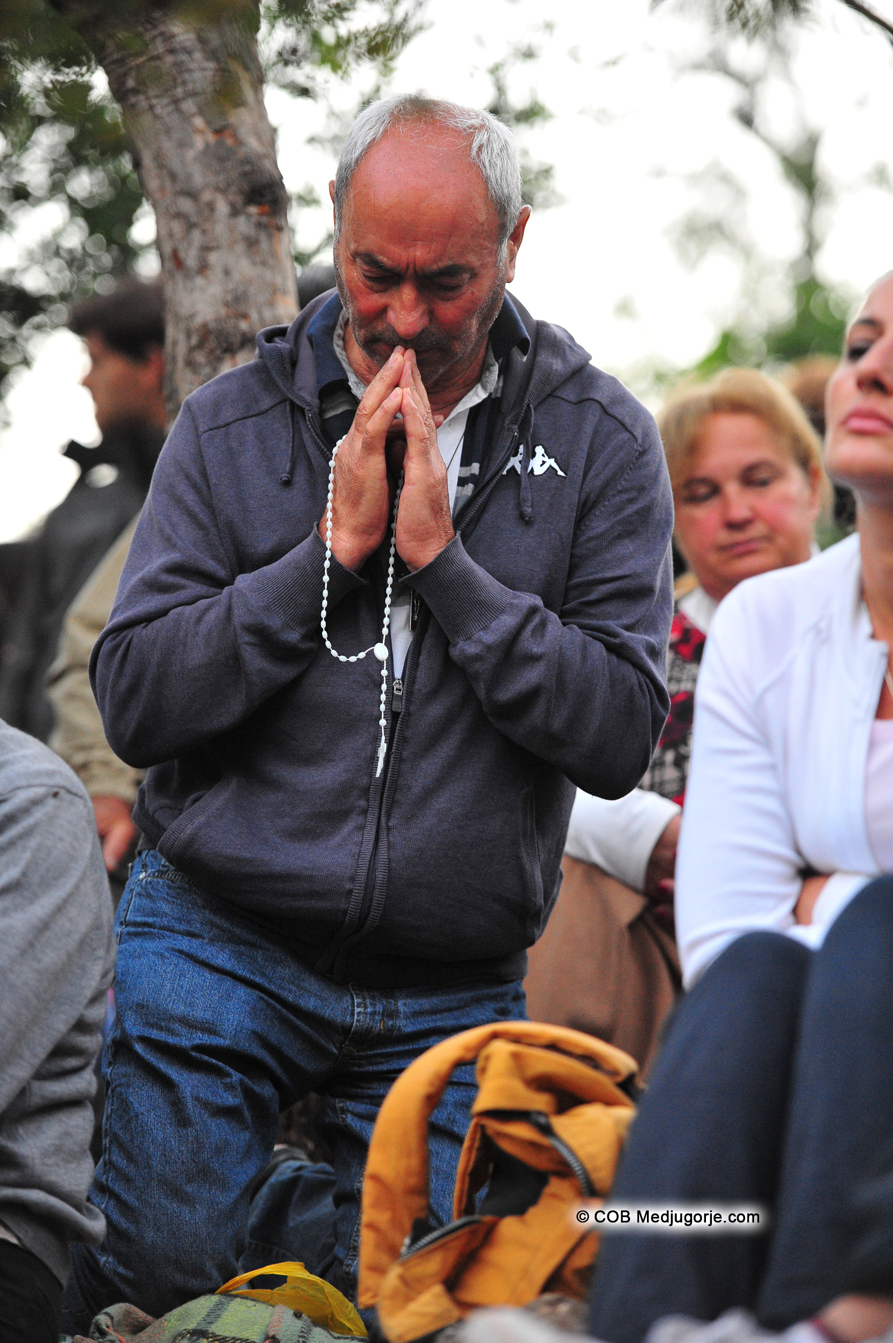 Pilgrim praying August 2, 2014