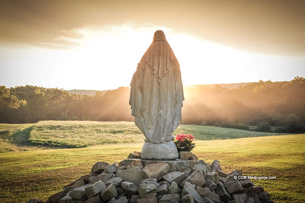 Our Lady in the Field at Caritas, at sunset