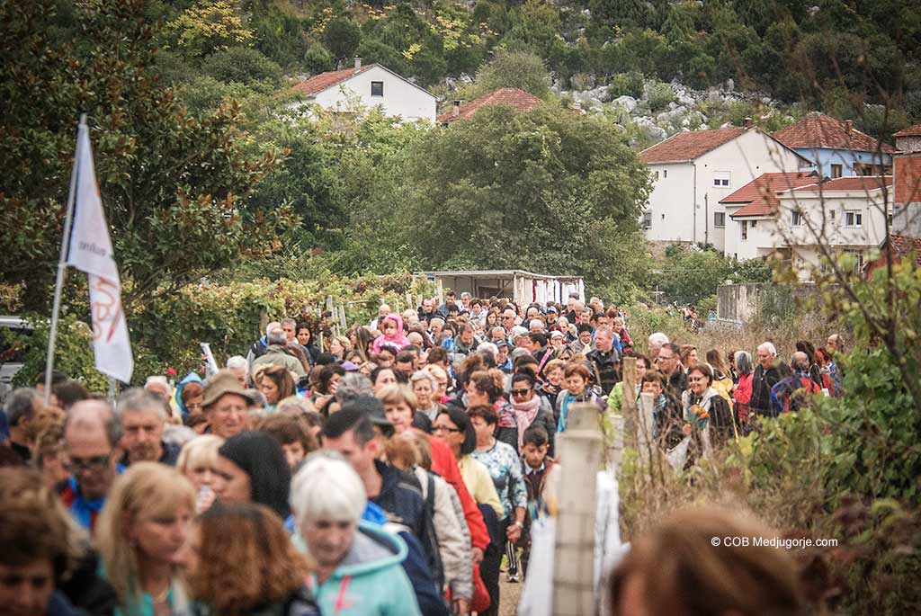 Crowds of pilgrims walk together in Medjugorje