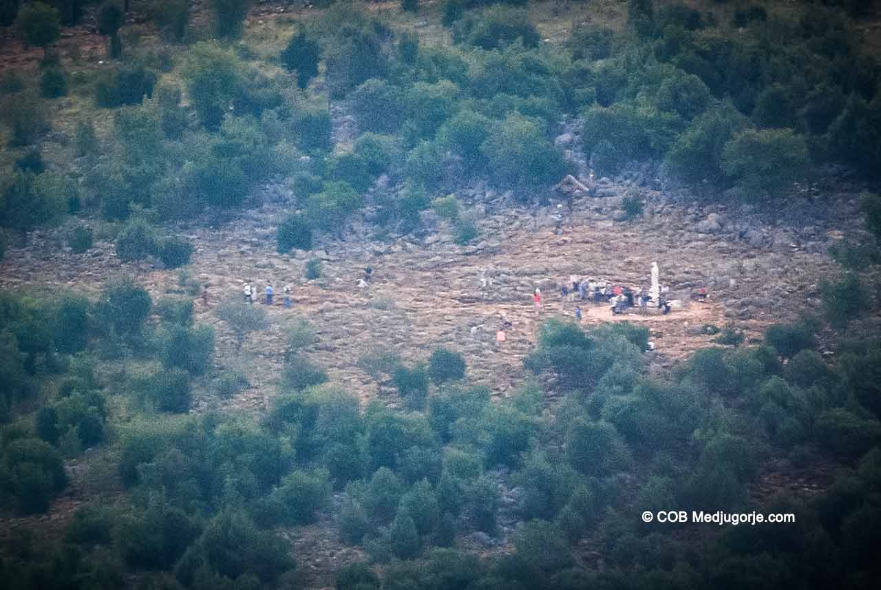 Pilgrims praying on Apparition Mountain from over one mile away