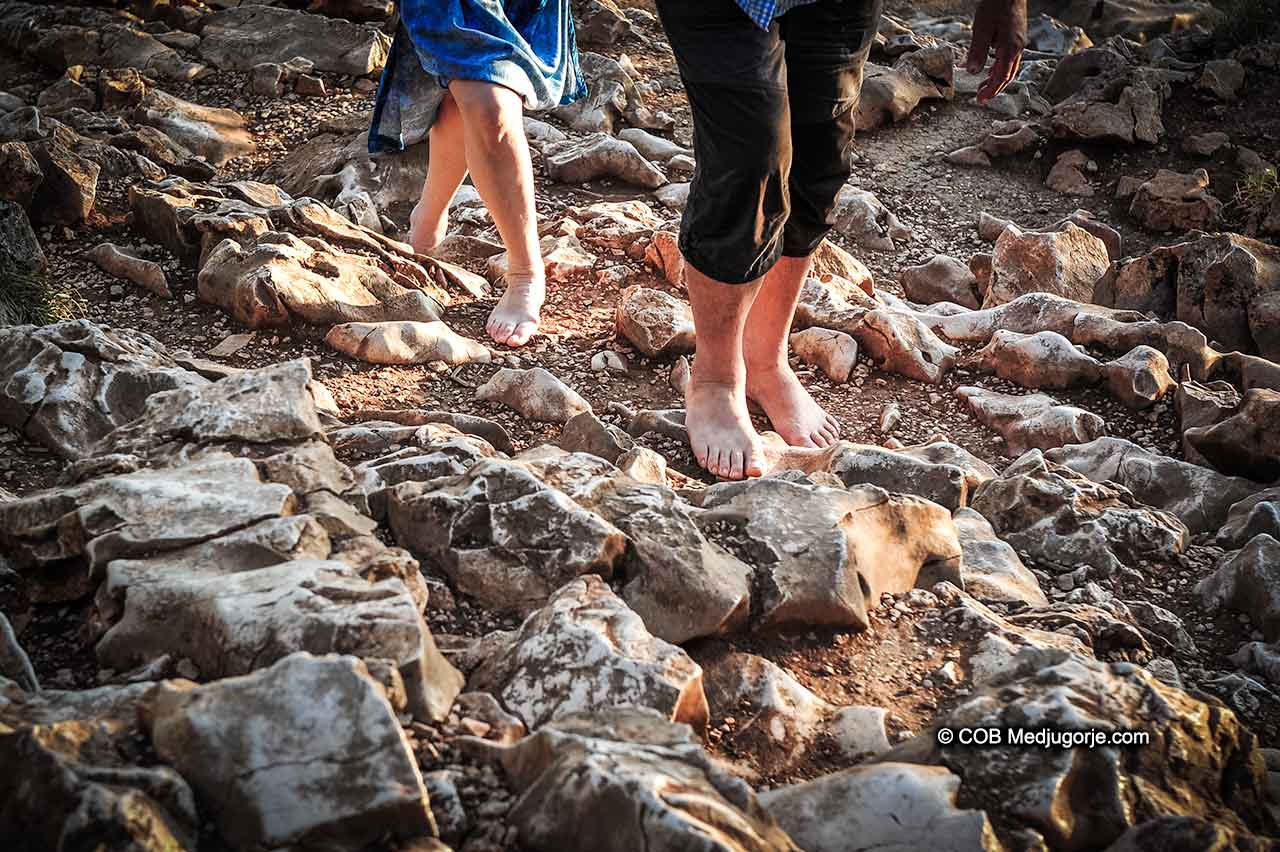 Pilgrims walking barefoot in Medjugorje, September 9, 2018