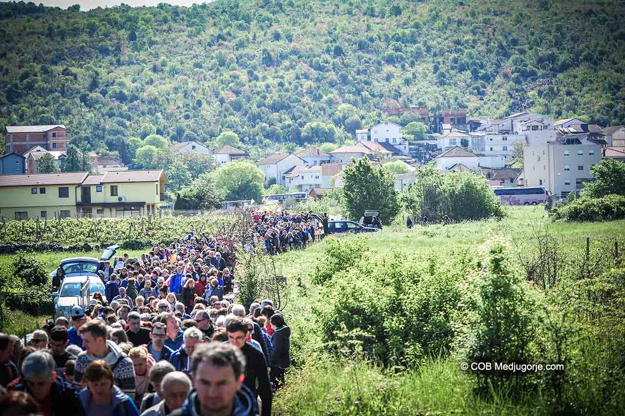 Pilgrims stream down the mountain in Medjugorje, May 2, 2019