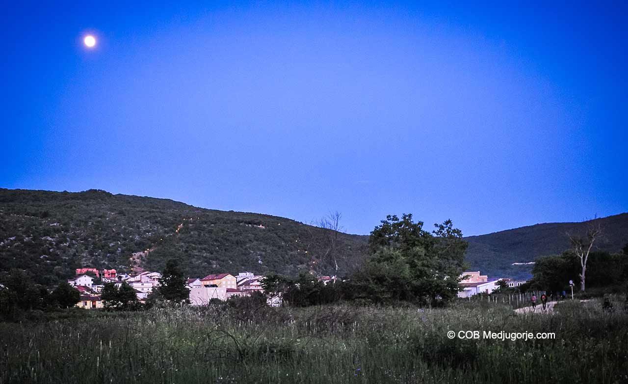 Moon rise over Apparition Mountain in Medjugorje, Friday May 17, 2019