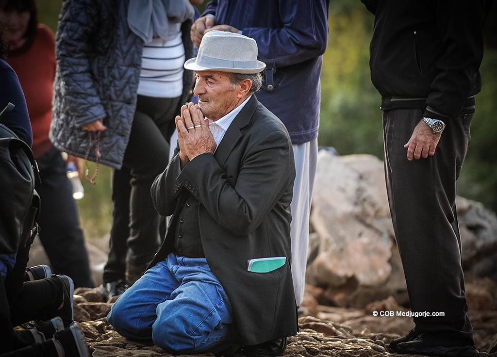 Pilgrim praying, October 4, 2019