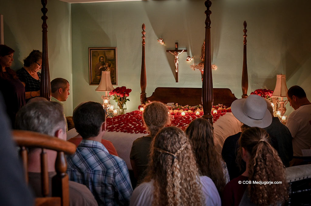 Pilgrims praying in the Bedroom of Apparitions, Caritas of Birmingham, October 21, 2020