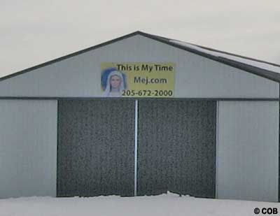 Our Lady sign on Barn