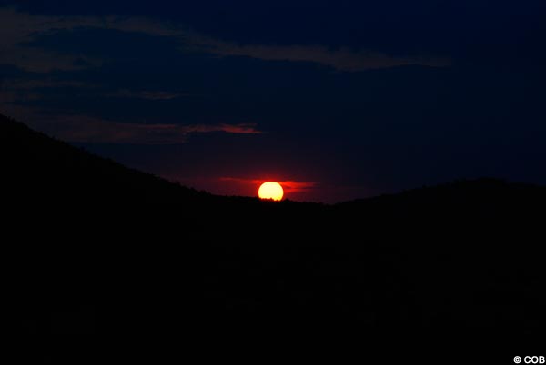 The sun setting over Cross Mountain September 11, 2009
