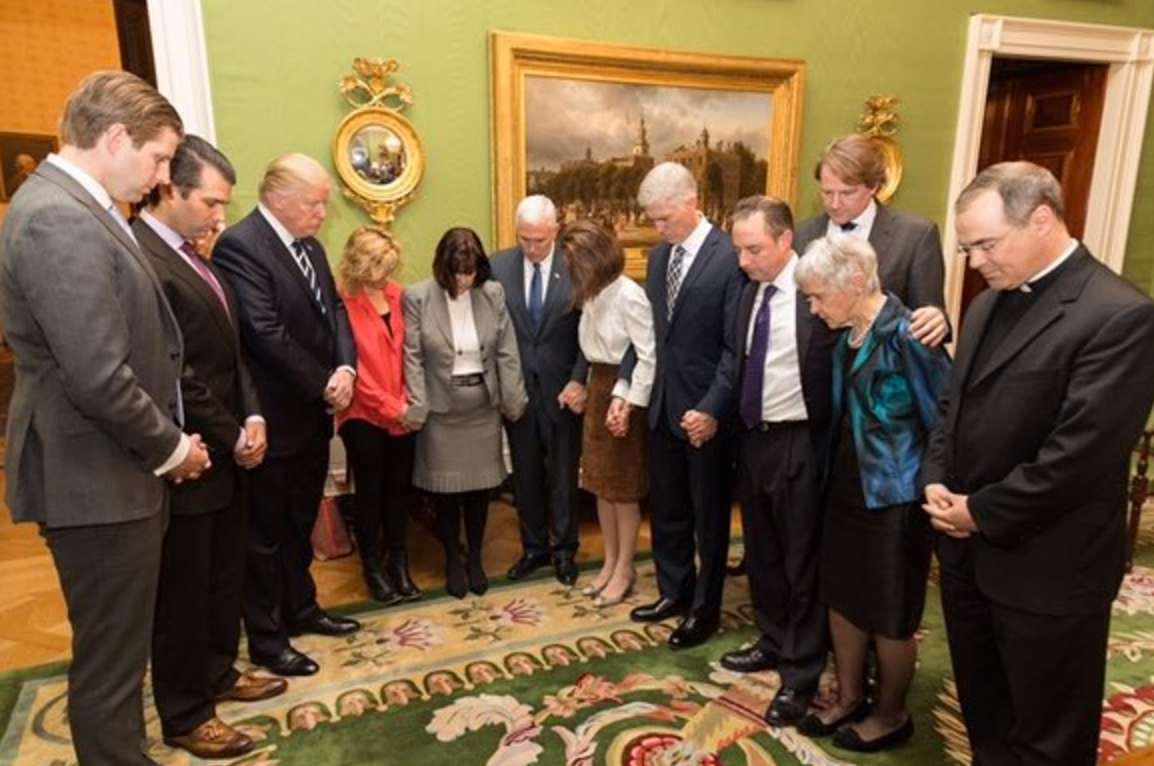 Trump praying at the White House, January 31, 2017