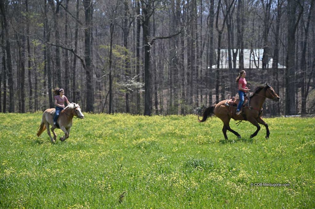 Girls racing on horses to the fire March 28, 2022